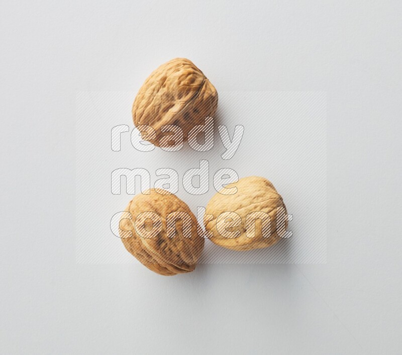 Top-view shot of walnut on white background