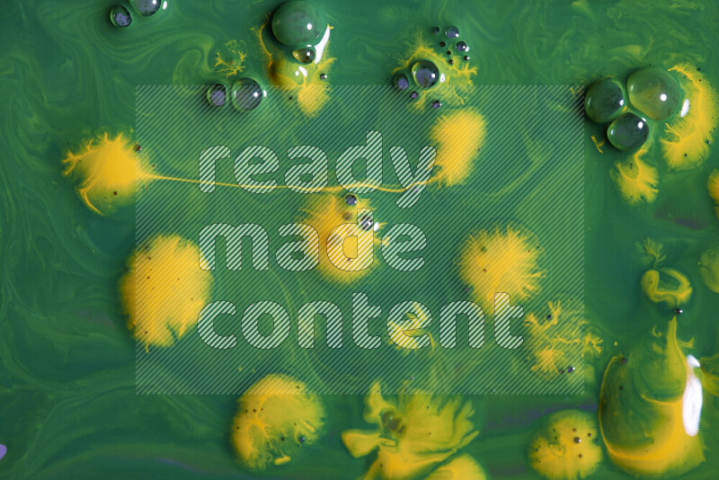 Abstract colorful background with mixed of green and yellow paint colors