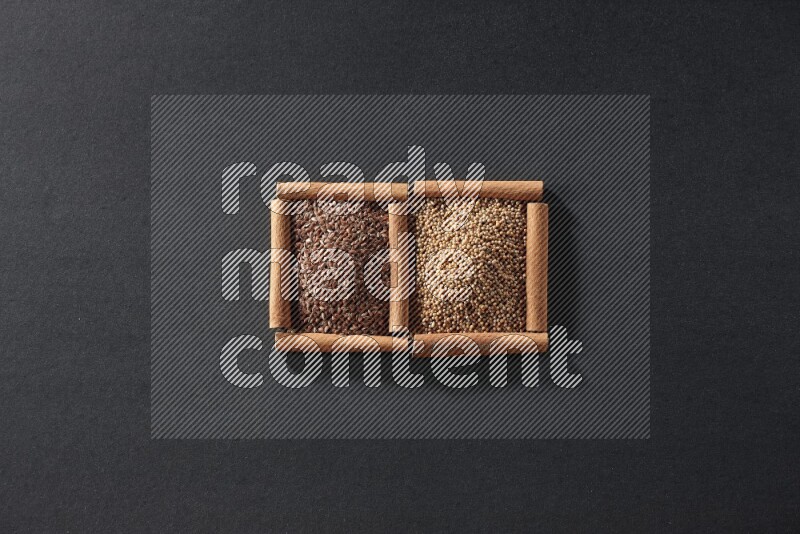 2 squares of cinnamon sticks full of mustard seeds and flaxseeds on black flooring
