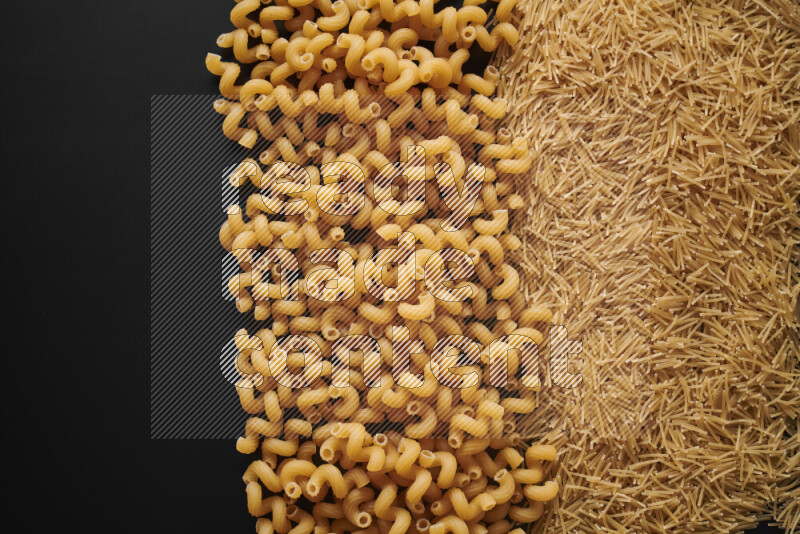 Different pasta types on black background