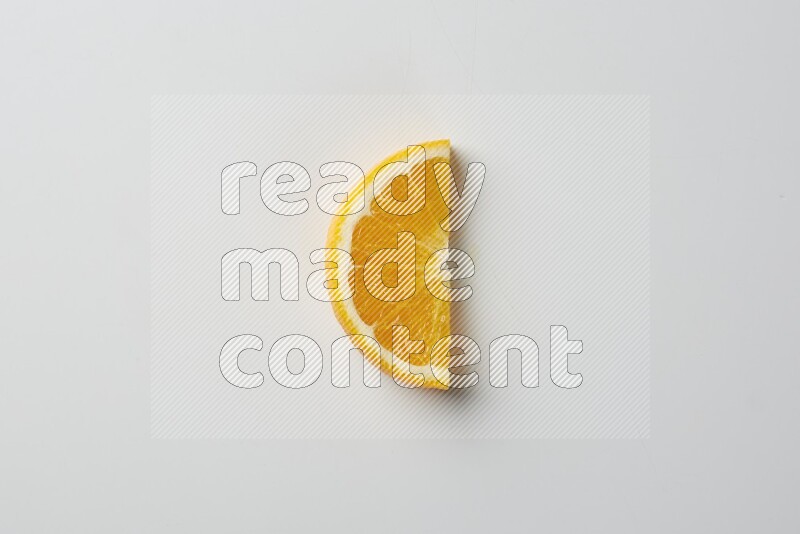 An orange half slice on white background