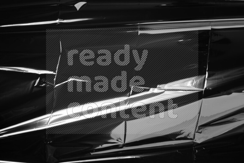 Plastic wrap texture on black background