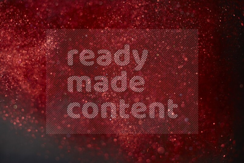 Red glitter powder isolated on black background