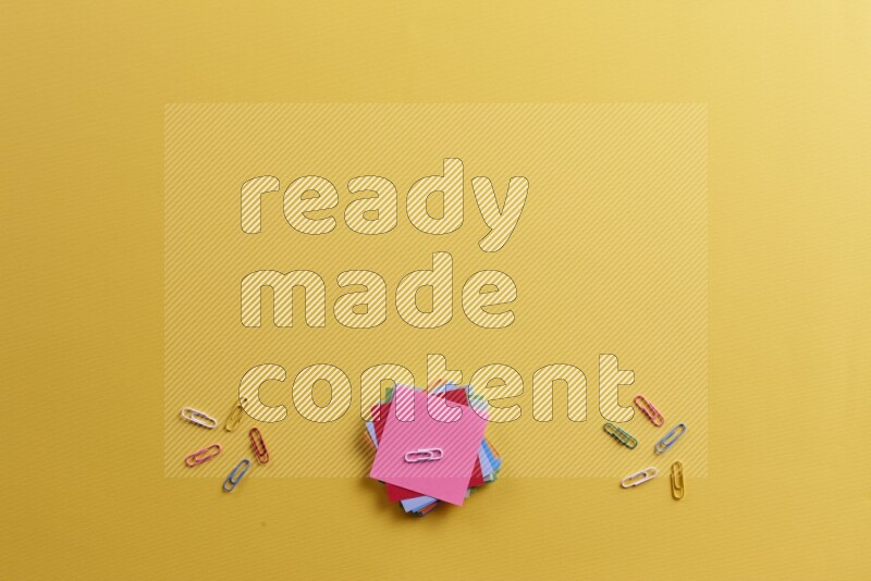 Multicolored sticky notes with school supplies on yellow background