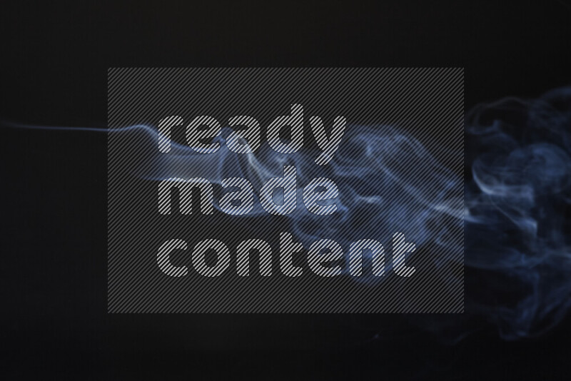 Motion of wavy smoke isolated on dark background