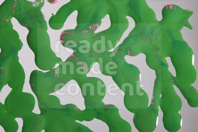 Abstract colorful background with mixed of pink and green paint colors