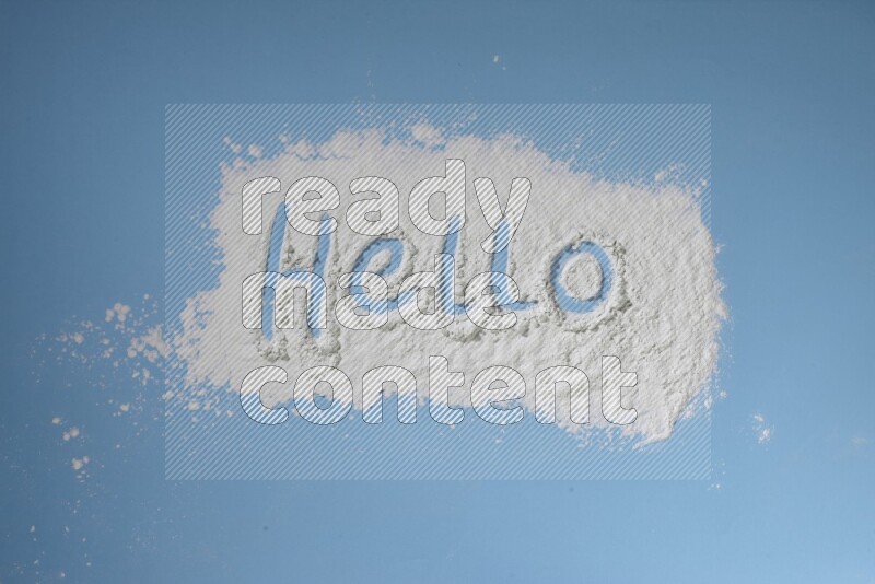 A word written with powder on blue background