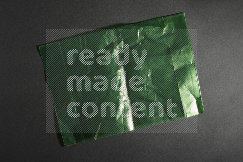 Colored plastic textures on black background