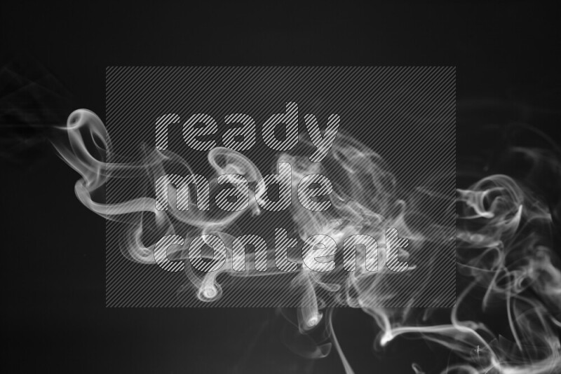 Motion of wavy smoke isolated on dark background