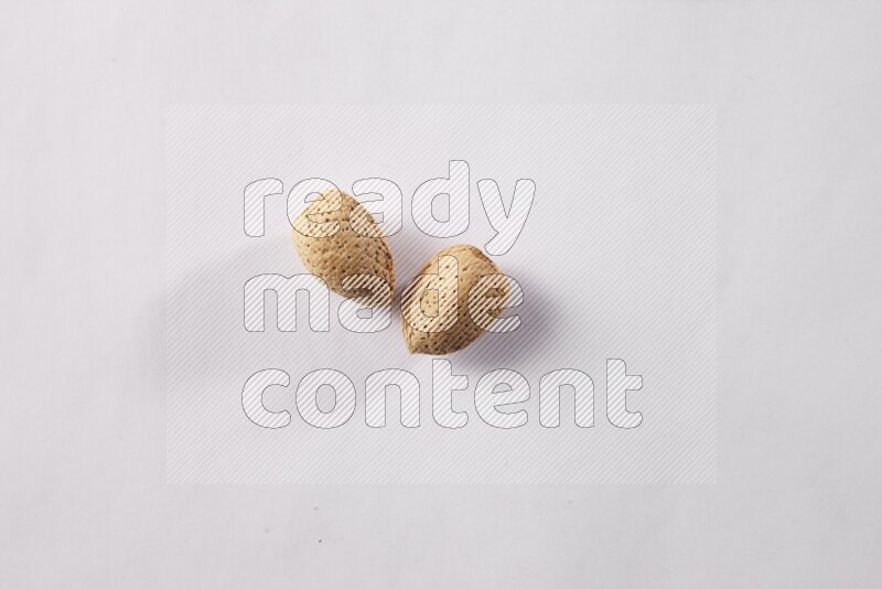 Almonds on white background