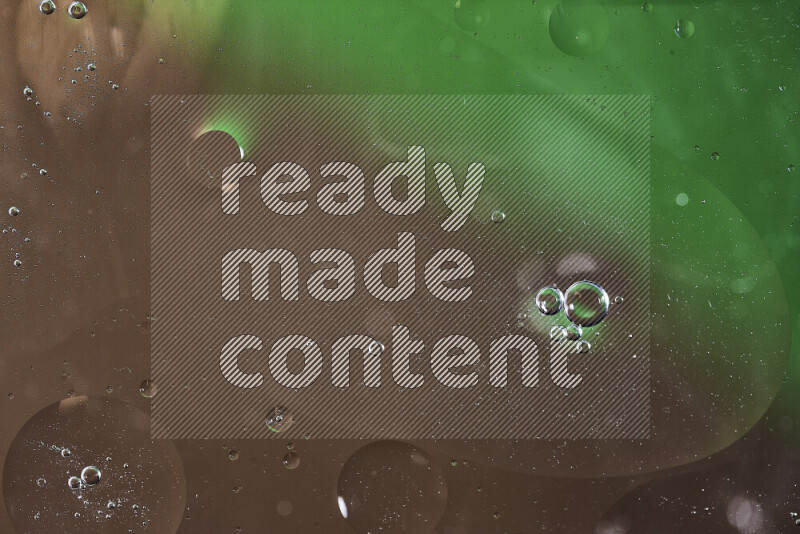 Close-ups of abstract oil bubbles on water surface in shades of green and brown