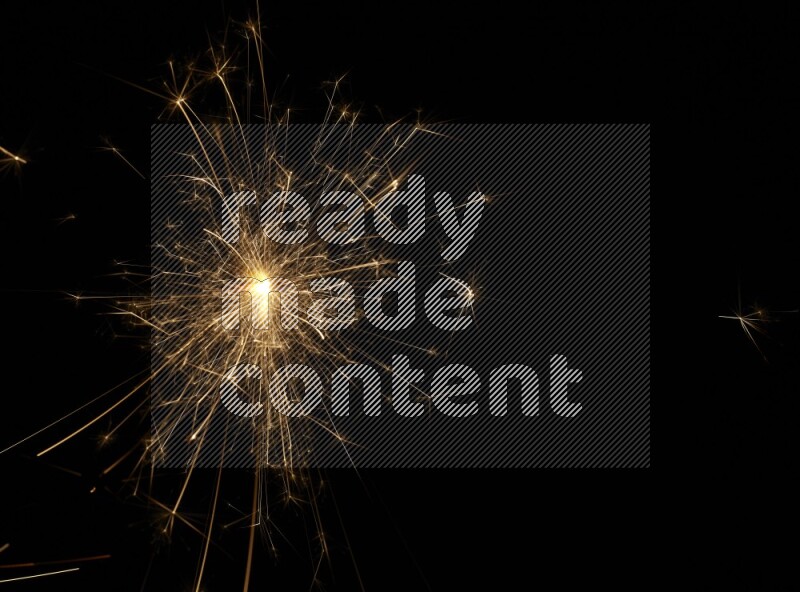 Sparkler candle isolated on black background