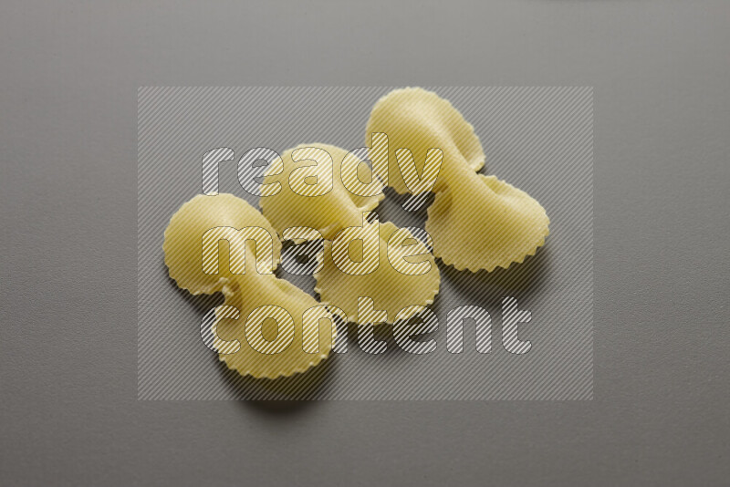 Fiocchi pasta on grey background