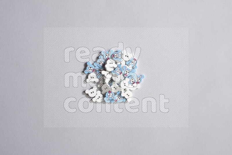 Multicolored buttons placed on grey background