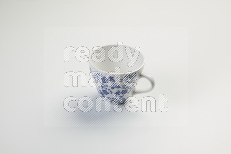 white and blue mug on white background