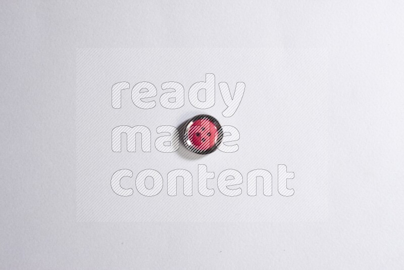 One colored button on grey background