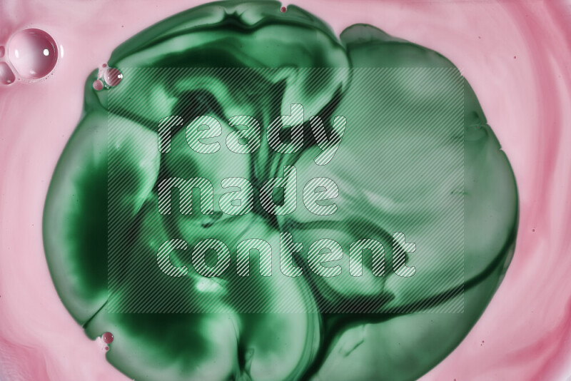 A close-up of abstract swirling patterns in red and green