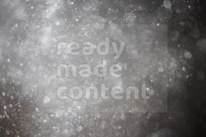 Silver glitter powder isolated on black background