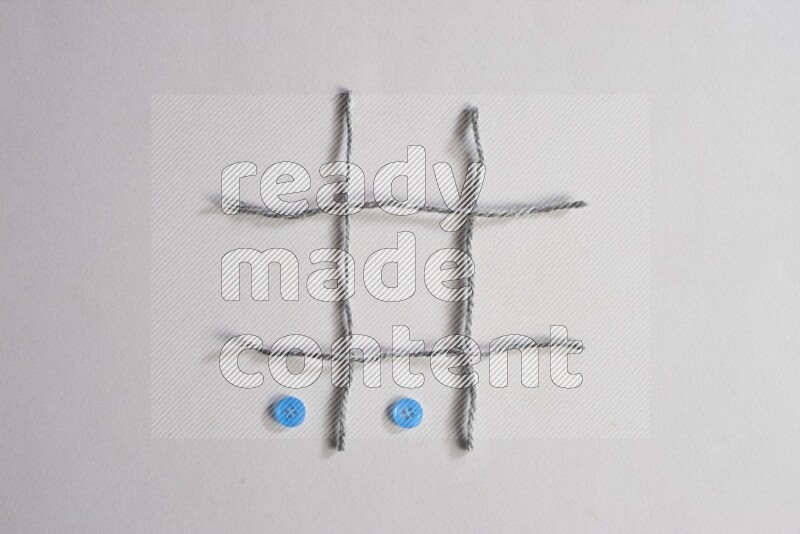 Blue buttons placed on grey background