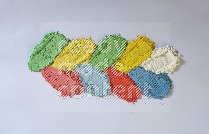 Multicolored powder strokes on white background