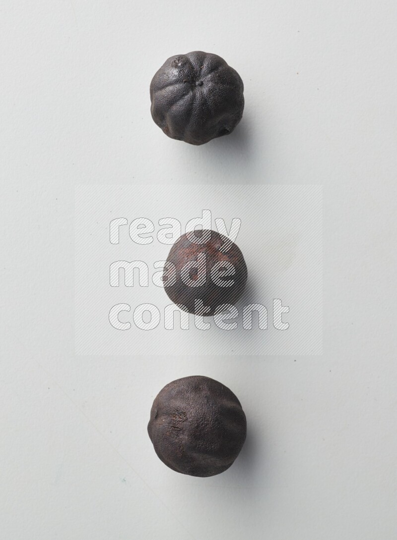Top-view shot of dried lime (loomi) on white background