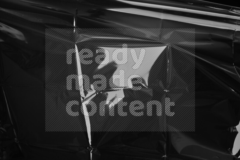 Plastic wrap texture on black background