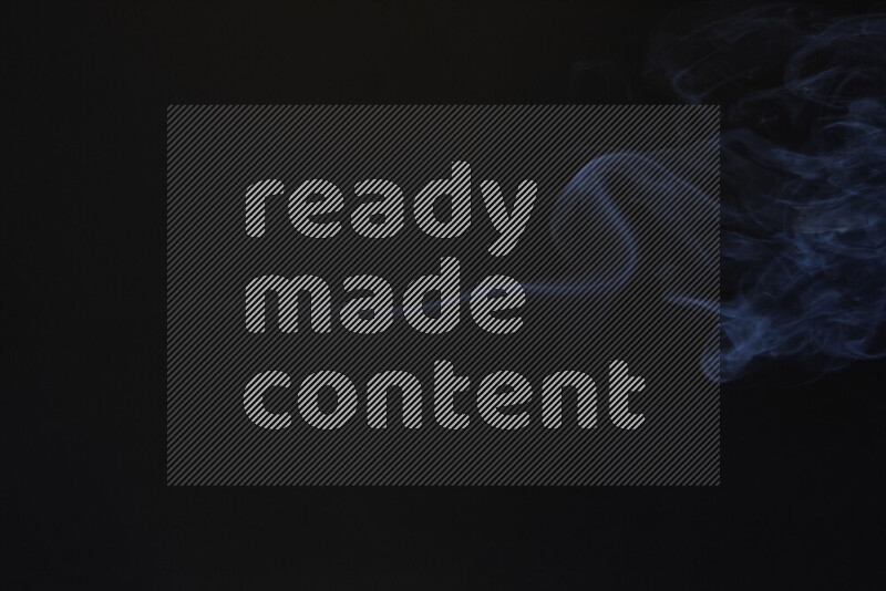 Motion of wavy smoke isolated on dark background