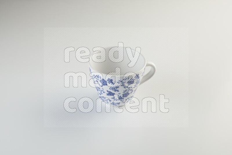 white and blue mug on white background