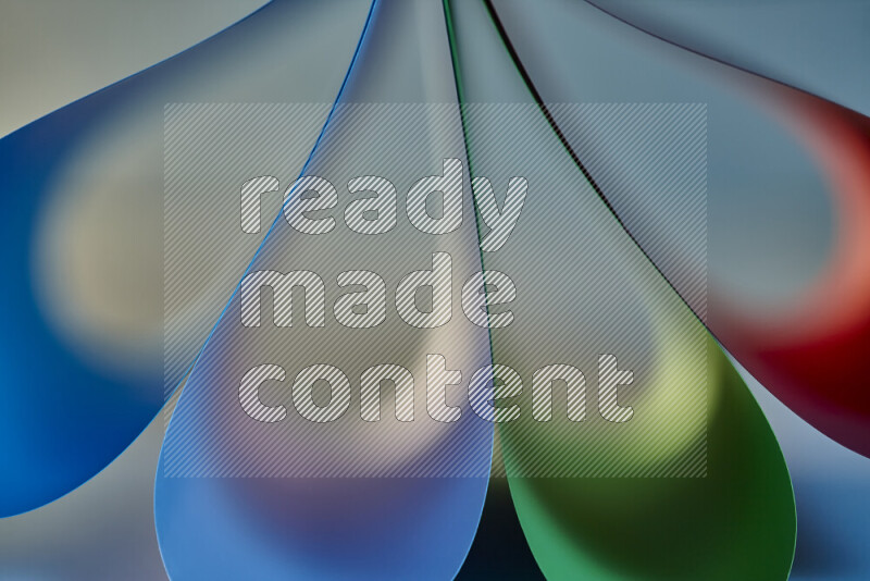 فن تجريدي يعرض منحنيات وتدرجات اللون مكونه بضوء ملون