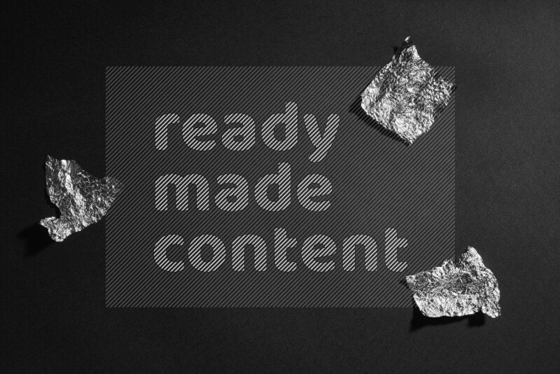 Aluminium foil on black background