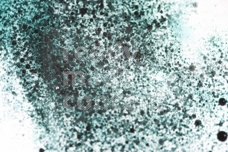 Close-ups of abstract green watercolor drops on oil Surface on white background