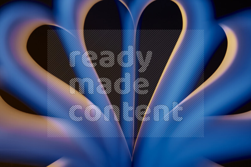 An abstract art piece displaying smooth curves in yellow and blue gradients created by colored light