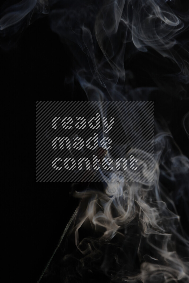 Motion of wavy smoke isolated on dark background