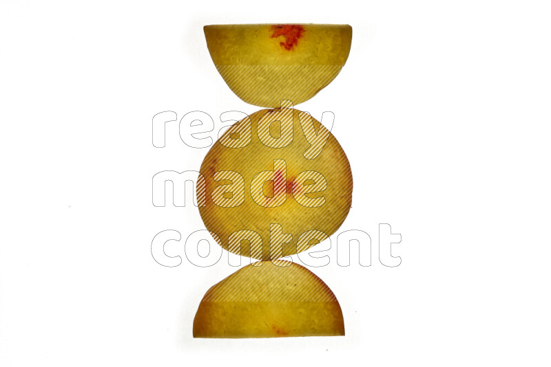 Peach slices on illuminated white background