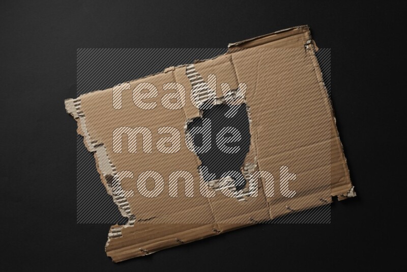 Cardboard on black background