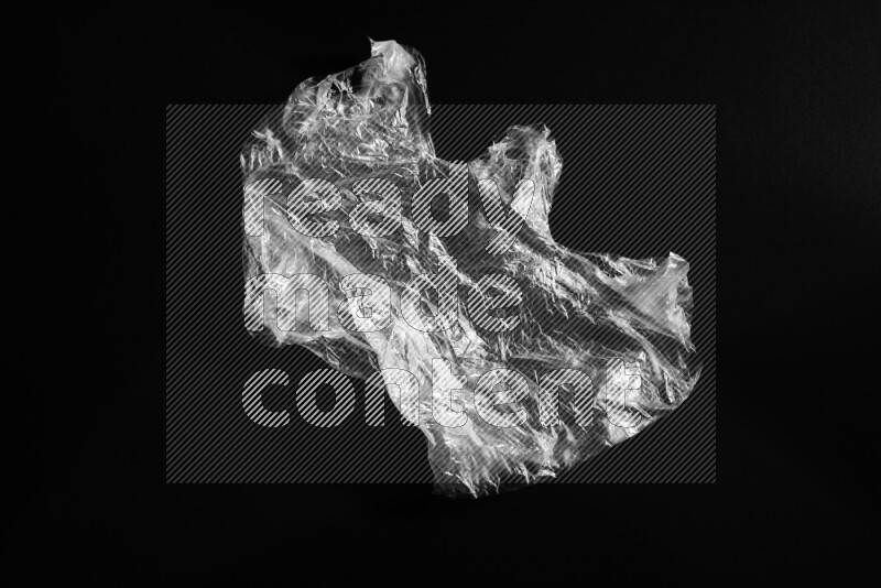 Transparent plastic textures on black background