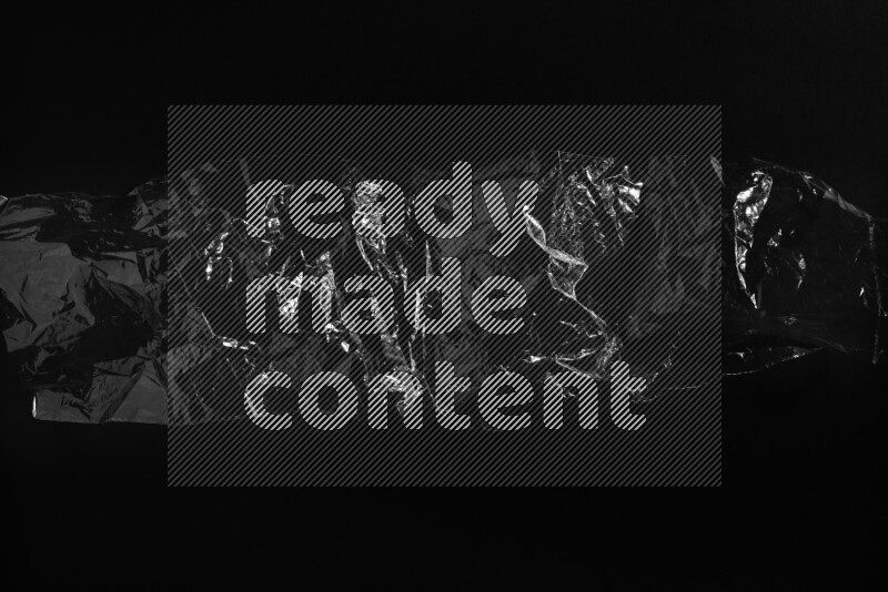 Transparent plastic textures on black background