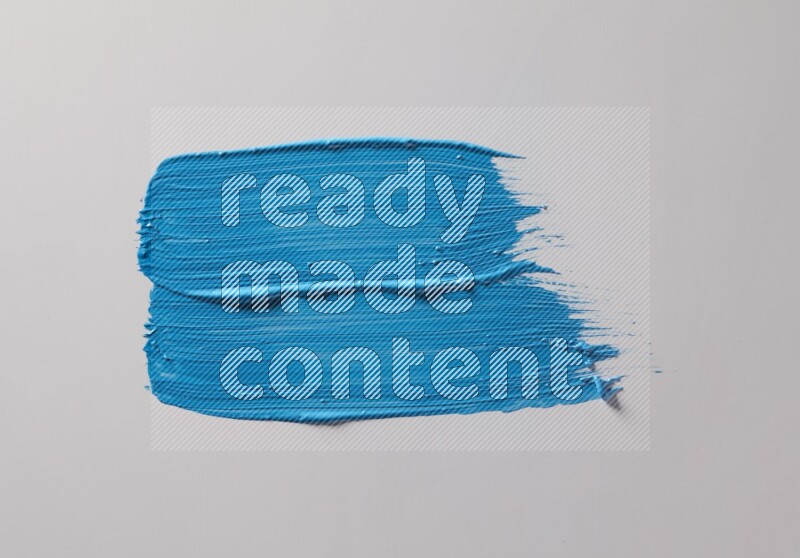 Multi blue straight brush strokes in different shapes on a white background