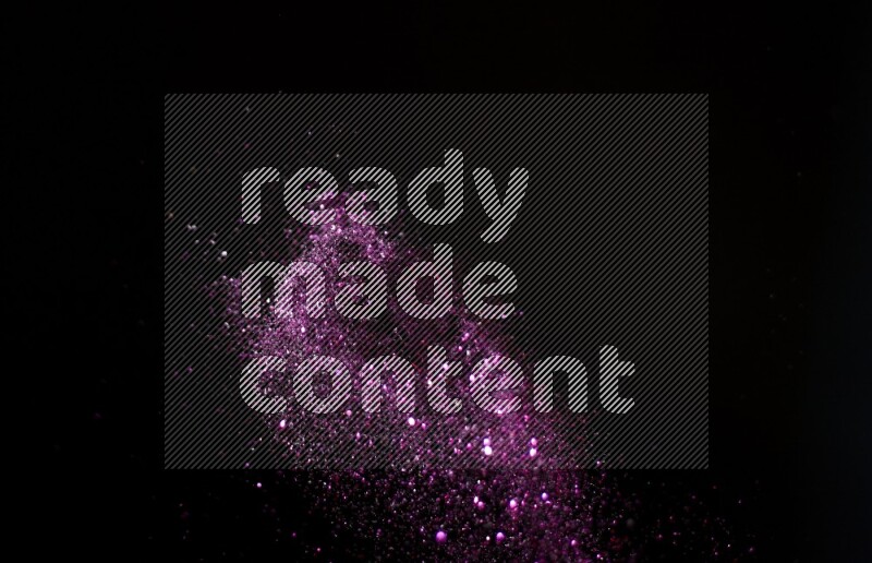 Pink glitter powder isolated on black background