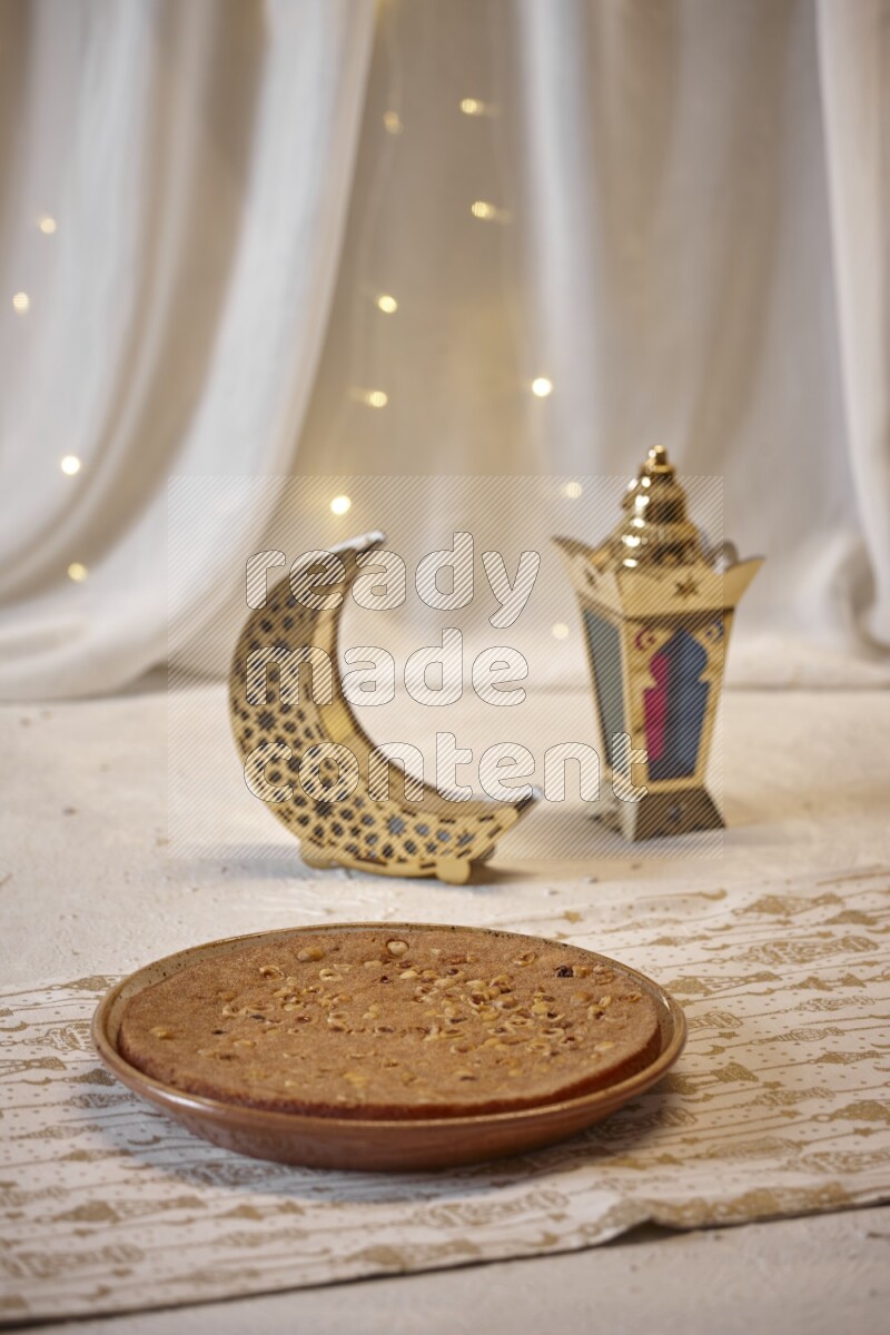 Basbousa with lanterns in a light setup