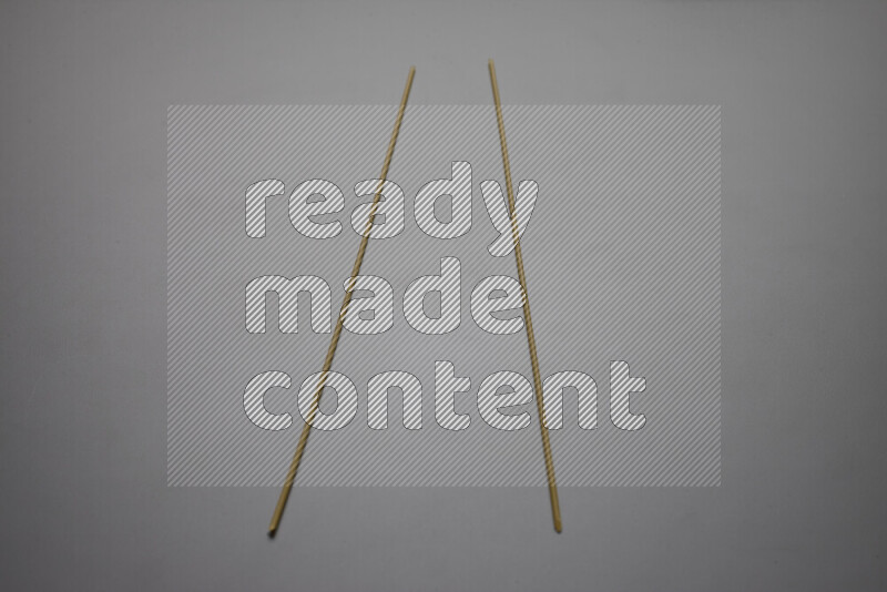 Spaghetti pasta on grey background