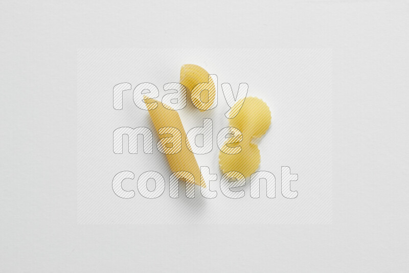 Different pasta types on white background