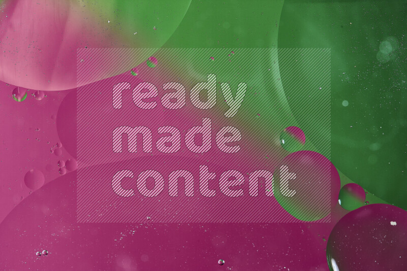 Close-ups of abstract oil bubbles on water surface in shades of green and pink