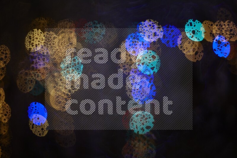 Bokeh light in multicolor with water drops