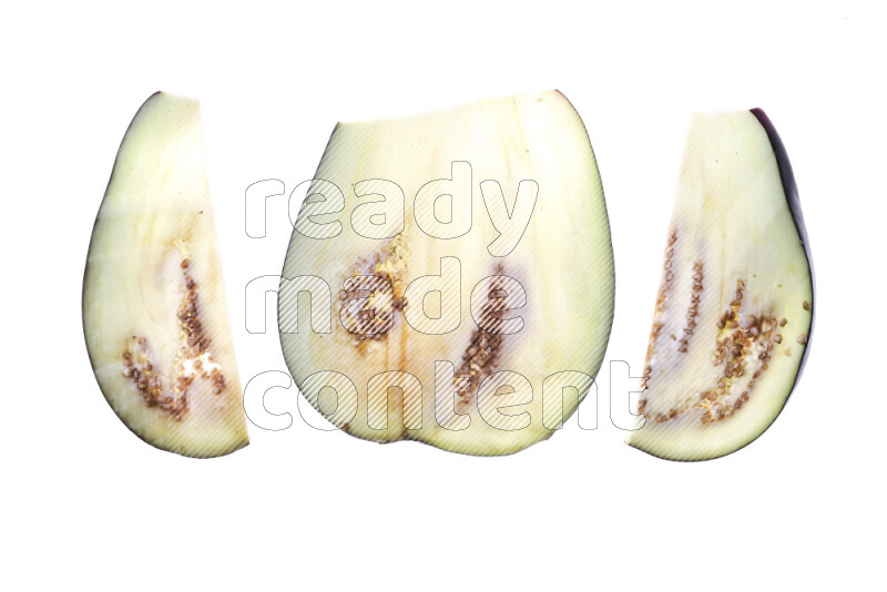 Eggplant slices on illuminated white background
