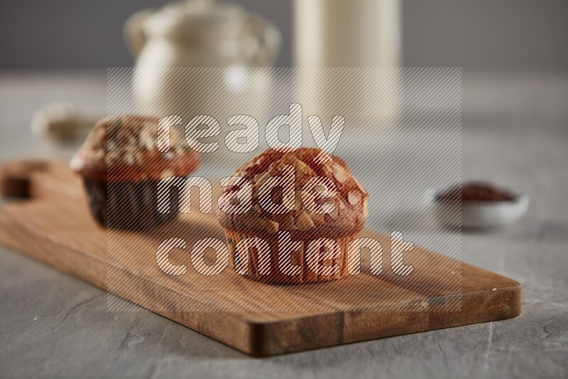 Almond cupcake on a wooden board