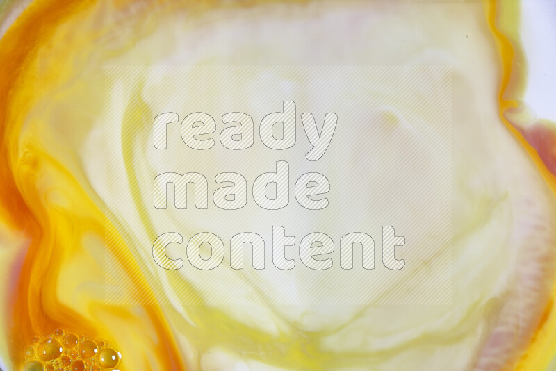 A close-up of abstract swirling patterns in orange, red and white