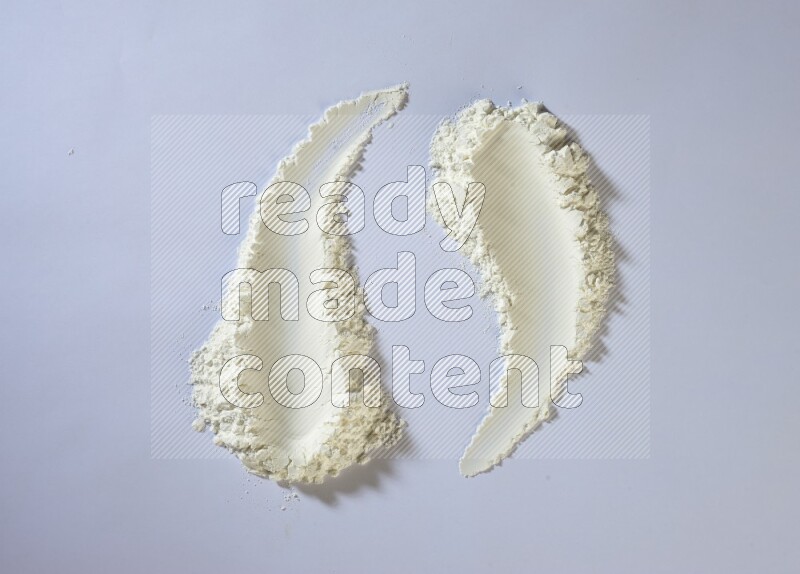 White powder strokes on white background