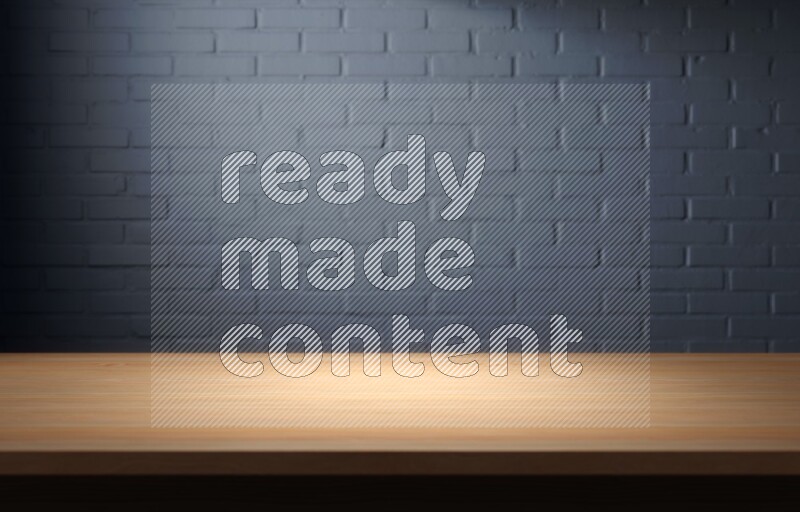 A wooden table top with colored brick wall background
