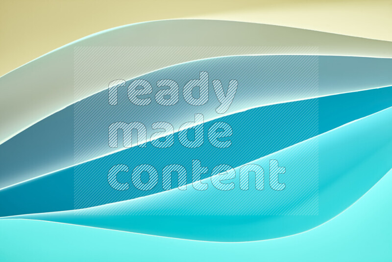 This image showcases an abstract paper art composition with paper curves in blue gradients created by colored light